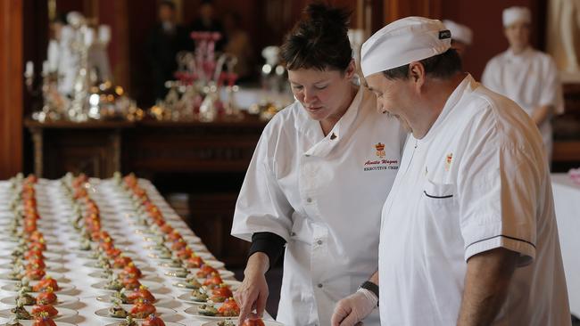 Executive Chef of Government House, Anstie Wagner (facing camera) prepares entrees for the luncheon in honour of President Xi Jinping's visit to Tasmania.