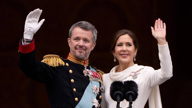 King Frederik X of Denmark and Queen Mary of Denmark wave on the balcony of Christianborg Palace in Copenhagen. Picture: Photo by Bo Amstrup / Ritzau Scanpix / AFP) / Denmark OUT