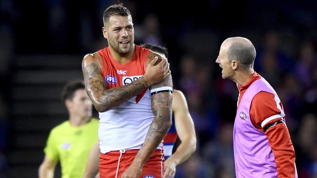 Buddy looked sore after a knock to the shoulder, but managed to stay on the ground and should be available this weekend. Picture: AAP