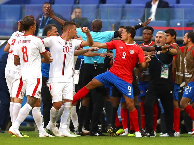 The referee tries to gain control. Picture: Getty