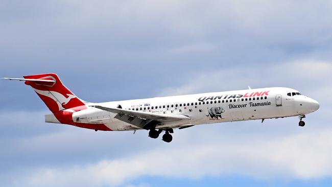 SYDNEY, AUSTRALIA - NewsWire Photos NOVEMBER 3, 2022: A QantasLink plane prepares to land at Sydney Domestic Airport.Picture: NCA NewsWire / Jeremy Piper