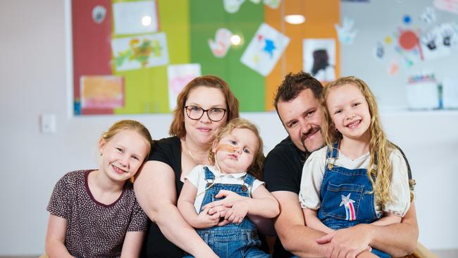 Rebecca and Brett Reed with their children Charlotte, 10, Lachlan, 3, and Olivia, 7. Photo: Flair Media Co.