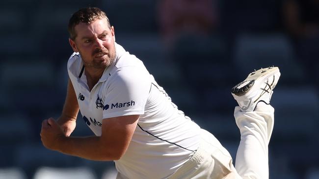 Jon Holland of Victoria bowls during the Sheffield Shield match against Western Australia. (Photo by Paul Kane/Getty Images)