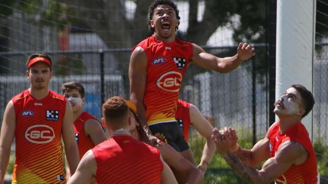 Malcolm Rosas climbs high for a pack mark in a Suns intraclub match. Picture: Gold Coast Suns/Media