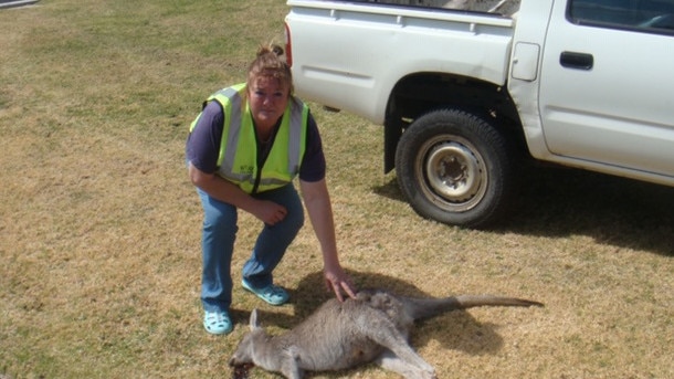 Janine Green with one of the dead kangaroos. Picture: Supplied