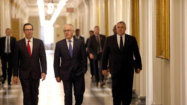 Australian ambassador to the US, Joe Hockey (right) with Malcolm Turnbull and Treasury Secretary Steve Mnuchin arriving at a Washington DC breakfast meeting. (Pic: Nathan Edwards)