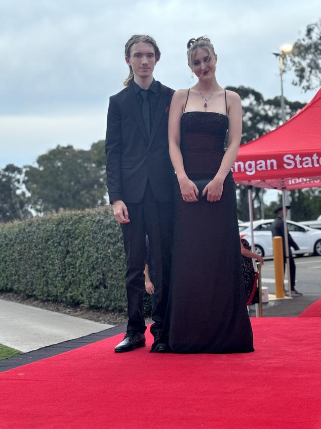 Students from Urangan State High School arrive at their formal.