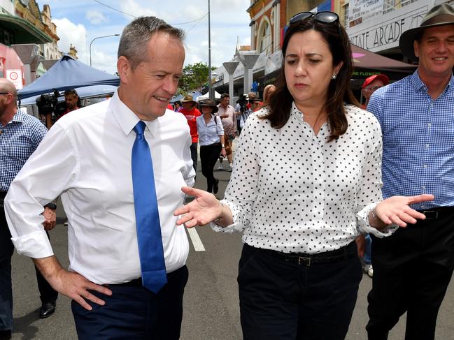 ALP federal Opposition Leader, Bill Shorten (left) and Queensland Premier Annastacia Palaszczuk (right) are seen during a street walk together in Adelaide Street in Maryborough during the Queensland Election campaign on Thursday, November 9, 2017. Premier Palaszczuk announced during her visit to Maryborough that if re-elected her government would make a $150 million commitment to protect and create new jobs in the manufacturing sector. (AAP Image/Darren England) NO ARCHIVING