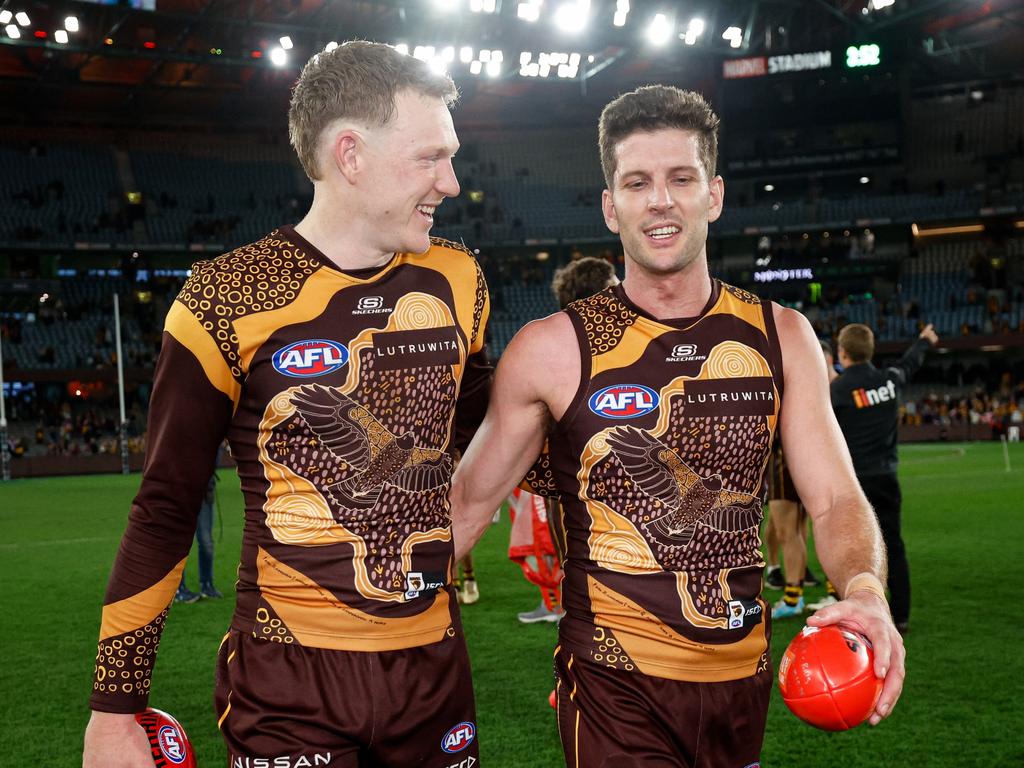 James Sicily and Luke Breust of the Hawks during the 2024 AFL Round 11 match between the Hawthorn Hawks and the Brisbane Lions at Marvel Stadium on May 26, 2024 in Melbourne, Australia. (Photo by Dylan Burns/AFL Photos via Getty Images)