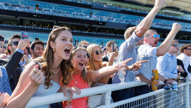 WEEKEND TELEGRAPH OCTOBER 14, 2023The Everest 2023 at Royal Randwick Racecourse. From left Brinda Cannock, Georgie Riley-Watkins, Ella Delaney and Evie de Mestre cheer for their horse. Picture: David Swift
