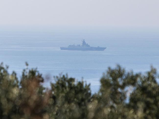 A Russian navy ship is pictured in the Mediterranean Sea off the port city of Tartus in western Syria on December 17, 2024. Islamist-led rebels took Damascus in a lightning offensive on December 8, ousting president Bashar al-Assad and ending five decades of Baath rule in Syria. (Photo by Bakr ALKASEM / AFP)