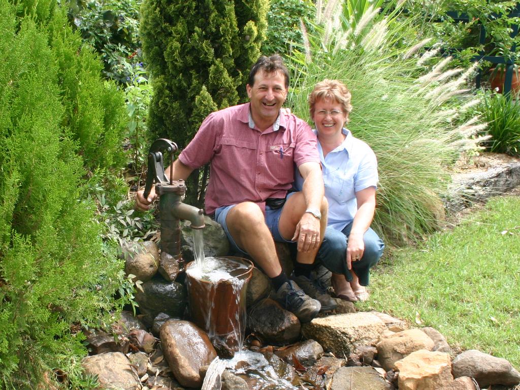 Garden of Percy and Glenis Pugliese at Warwick. An old water pump has been converted for a water feature. PicDrewFitzgibbon