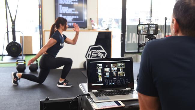 Mark monitors the participants as Kylie demonstrates the exercise. Picture: Josie Hayden