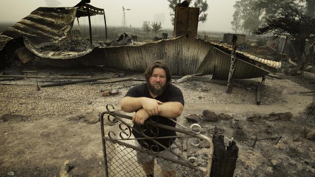 Josh Collings where his home once stood. Picture: Tony Gough