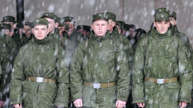 Russian conscripts wait for the dispatch at the military registration and enlistment office in the southern Russian city Stavropol, where a senior officer has been killed by an apparent suicide bombing. Picture: Danil Semyonov / AFP