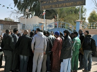 Relatives of wounded people at the gas plant, Algeria.