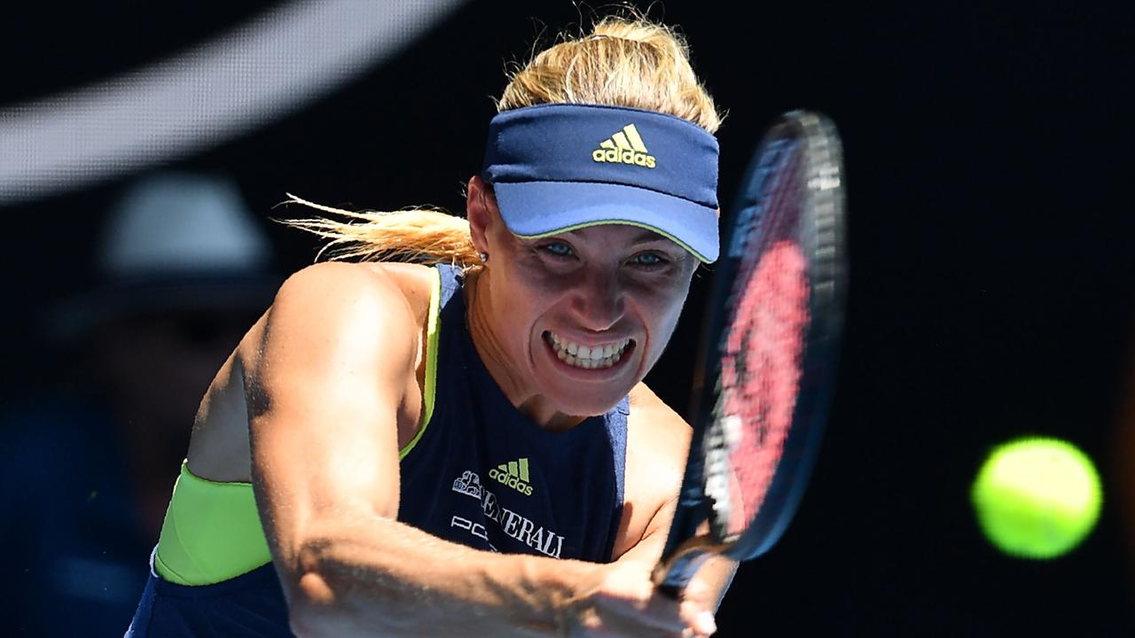 Germany's Angelique Kerber hits a return against Taiwan's Hsieh Su-Wei on day eight. Picture: AFP.