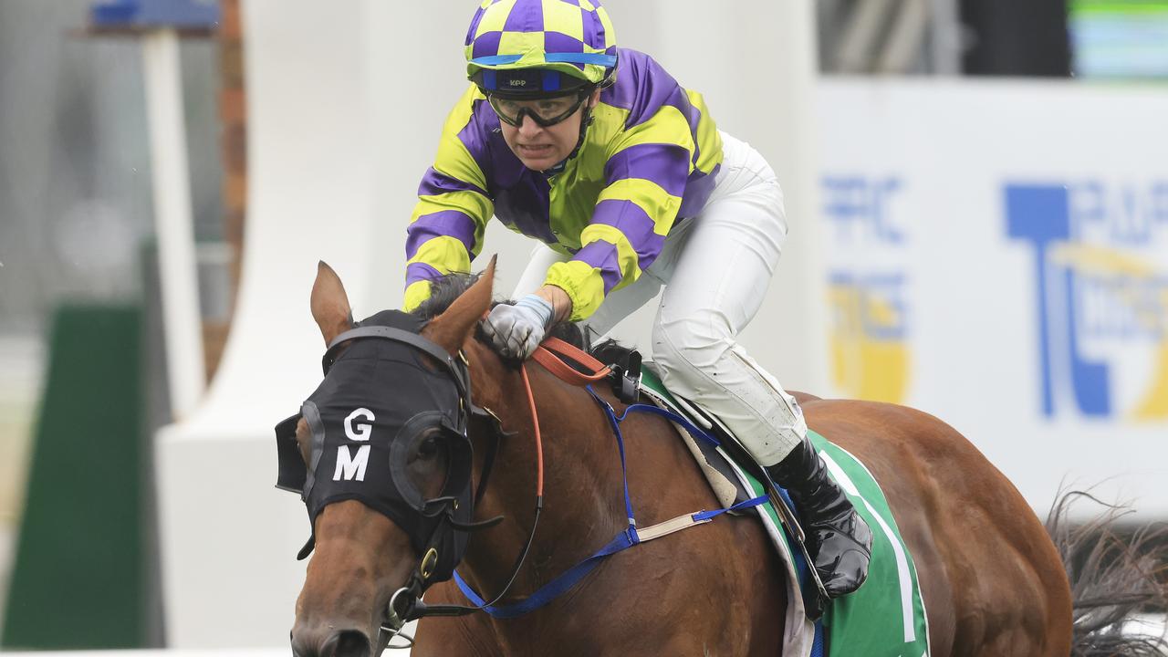 KEMBLA GRANGE, AUSTRALIA - NOVEMBER 20: Jenny Duggan on Point Counterpoint wins race 2 the TAB Highway Handicap during Sydney Racing at Kembla Grange Racecourse on November 20, 2021 in Kembla Grange, Australia. (Photo by Mark Evans/Getty Images)