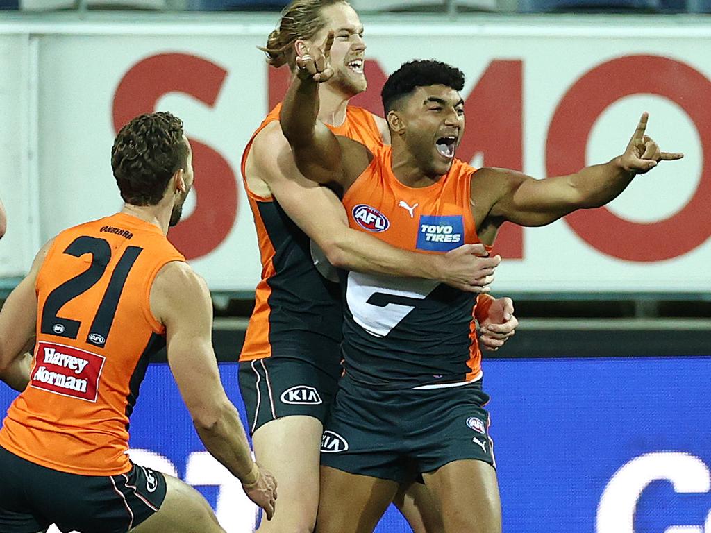 Brown celebrates his first career goal against Geelong in 2021. Picture: Michael Klein