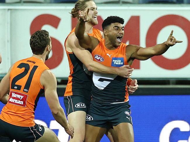 Brown celebrates his first career goal against Geelong in 2021. Picture: Michael Klein