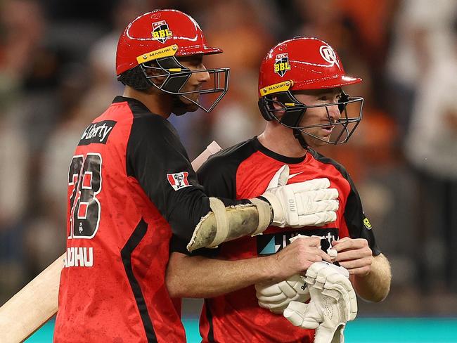 PERTH, AUSTRALIA - JANUARY 07: Gurinder Sandhu and Tom Rogers of the Renegades celebrate winning the BBL match between Perth Scorchers and Melbourne Renegades at Optus Stadium, on January 07, 2025, in Perth, Australia. (Photo by Paul Kane/Getty Images)