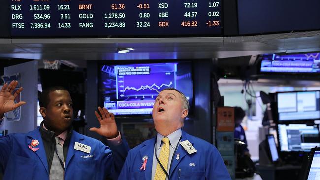 Traders work on the floor of the New York Stock Exchange. Picture: AFP