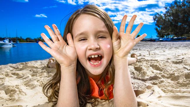 Molly Wright, 7, is asking parents to spend more time with their kids instead of on digital devices. Picture: Nigel Hallett