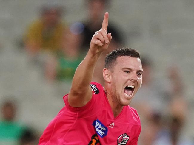 Josh Hazelwood of the Sixers celebrates a wicket during the Big Bash League (BBL) cricket match between the Melbourne Stars and the Sydney Sixers at the MCG in Melbourne, Friday, January 31, 2020. (AAP Image/Michael Dodge) NO ARCHIVING, EDITORIAL USE ONLY, IMAGES TO BE USED FOR NEWS REPORTING PURPOSES ONLY, NO COMMERCIAL USE WHATSOEVER, NO USE IN BOOKS WITHOUT PRIOR WRITTEN CONSENT FROM AAP