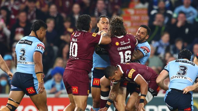 BRISBANE, AUSTRALIA - JULY 13: Selwyn Cobbo of the Maroons is attended to by Dane Gagai of the Maroons after a tackle during game three of the State of Origin Series between the Queensland Maroons and the New South Wales Blues at Suncorp Stadium on July 13, 2022, in Brisbane, Australia. (Photo by Chris Hyde/Getty Images)