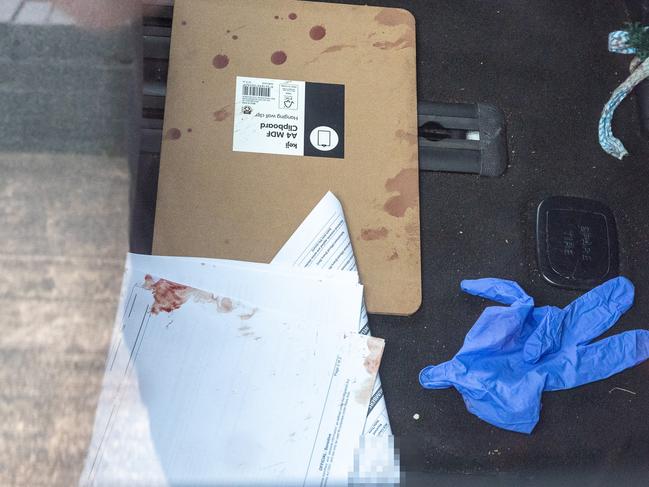 Blood splatter inside the car of an alleged stabbing of two border force contractors. Picture: Thomas Lisson