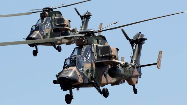 A pair of army ARH Tiger helicopters take part in a demonstration before the 2019 Avalon Airshow in Victoria. Picture: Stuart McEvoy