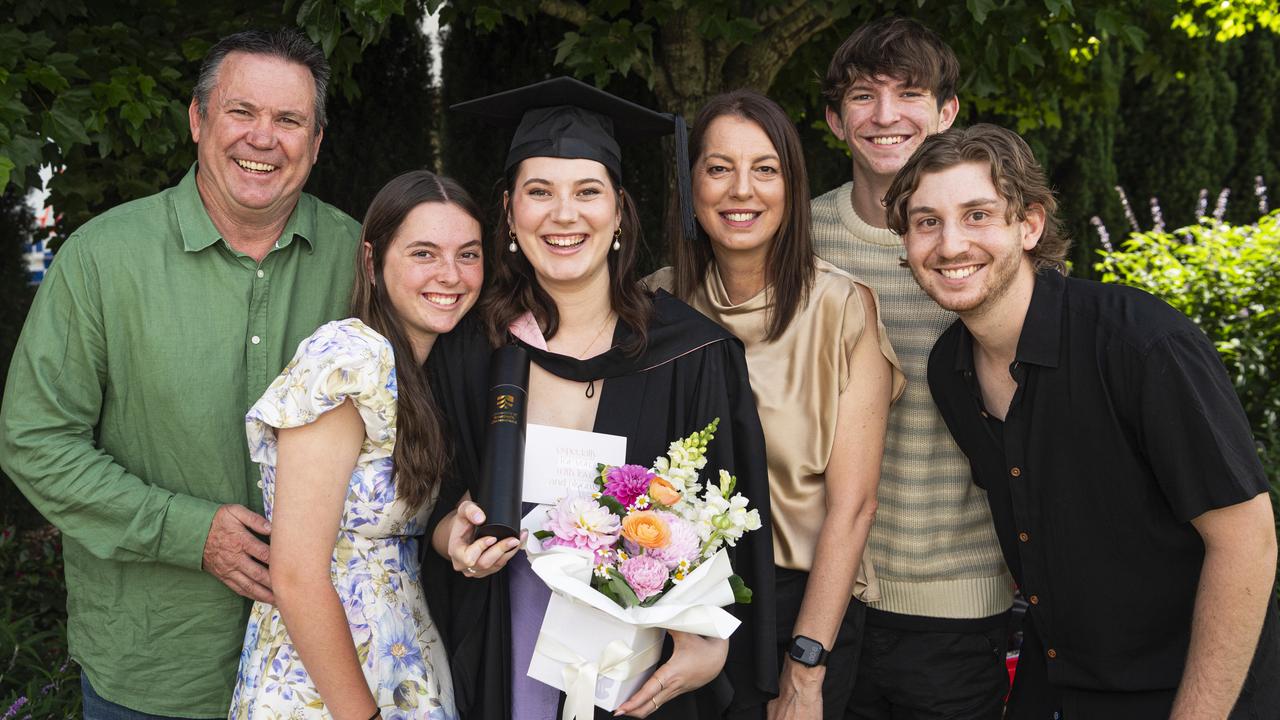 Bachelor of Education (Secondary) graduate Grace Trenaman with (from left) Peter, Lilah, Janelle and Isaac Trenam and Ashley Pailthorpe at a UniSQ graduation ceremony at The Empire, Wednesday, October 30, 2024. Picture: Kevin Farmer