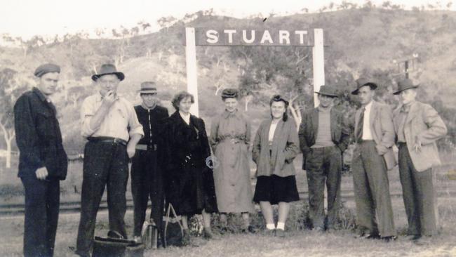 Migrants and locals wait at the Stuart railway station, circa 1950.