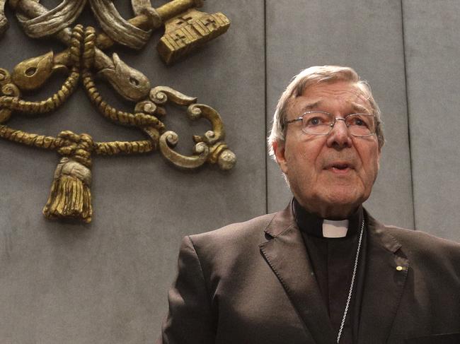 Cardinal George Pell meets the media, at the Vatican, Thursday, June 29, 2017. The Catholic Archdiocese of Sydney says Vatican Cardinal George Pell will return to Australia to fight sexual assault charges as soon as possible. (AP Photo/Gregorio Borgia)