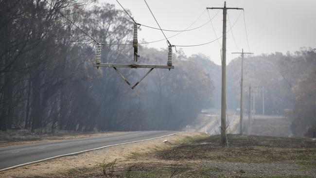 A missing power pole, burnt to ashes on the Genoa-Mallacoota road. Picture: David Caird