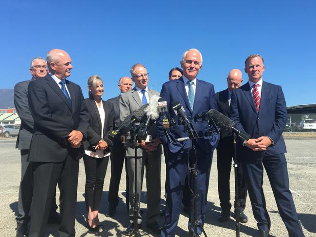 Prime Minister Malcolm Turnbull and Premier Will Hodgman with a host of other MPs at Macquarie Wharf in Hobart this morning. Picture: LUKE BOWDEN