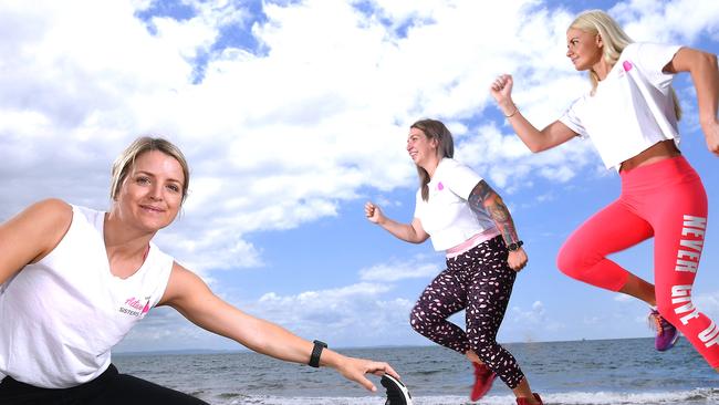 Personal trainers Angelina Barth, Ashley Burow and Sami Fisher on the beach at Margate. Picture: John Gass/AAP 