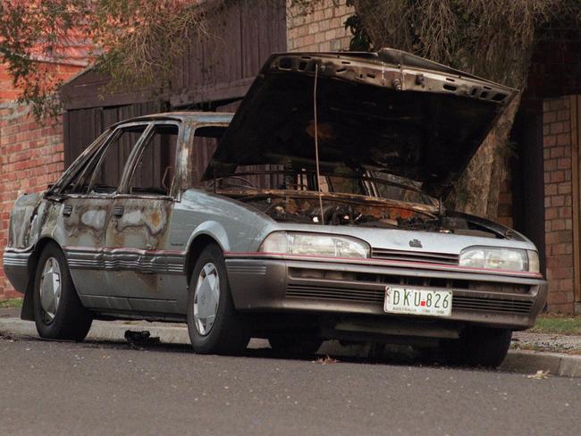 The burnt-out getaway car found three blocks from the scene of Jane Thurgood-Dove’s murder.