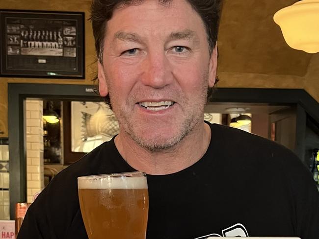 NRL great Mark "Spudd" Carroll with his new brew, "Spuddwiser" Picture: Supplied