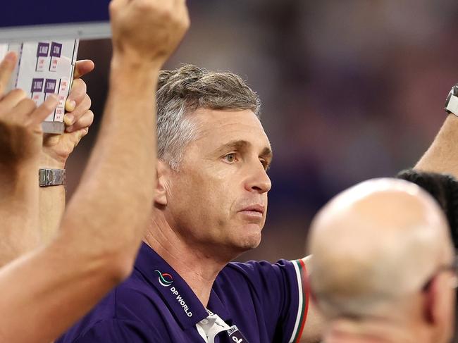 PERTH, AUSTRALIA – MAY 10: Justin Longmuir, Senior Coach of the Dockers addresses the team at the quarter time break during the 2024 AFL Round 09 match between the Fremantle Dockers and the Sydney Swans at Optus Stadium on May 10, 2024 in Perth, Australia. (Photo by Will Russell/AFL Photos via Getty Images)
