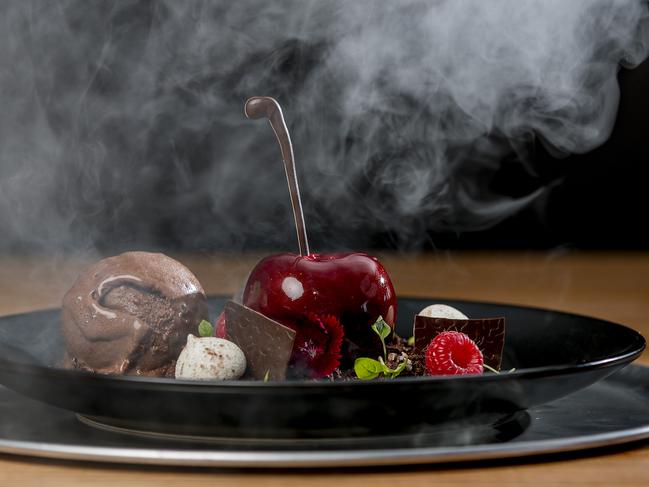 The Mist in the Woods dessert from the new Infinite Dessert Bar is pumped with smoke before diners lift the lid and watch the magic rise. Picture: Jerad Williams