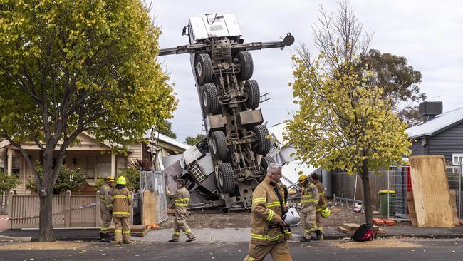 A crane has collapsed on two houses in Yarraville, Melbourne. Picture: AAP