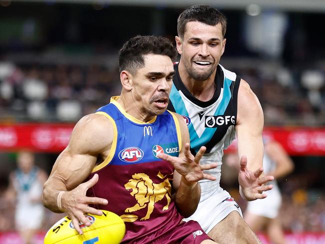 BRISBANE, AUSTRALIA - SEPTEMBER 09: Charlie Cameron of the Lions and Ryan Burton of the Power compete for the ball during the 2023 AFL Second Qualifying Final match between the Brisbane Lions and the Port Adelaide Power at The Gabba on September 09, 2023 in Brisbane, Australia. (Photo by Michael Willson/AFL Photos via Getty Images)