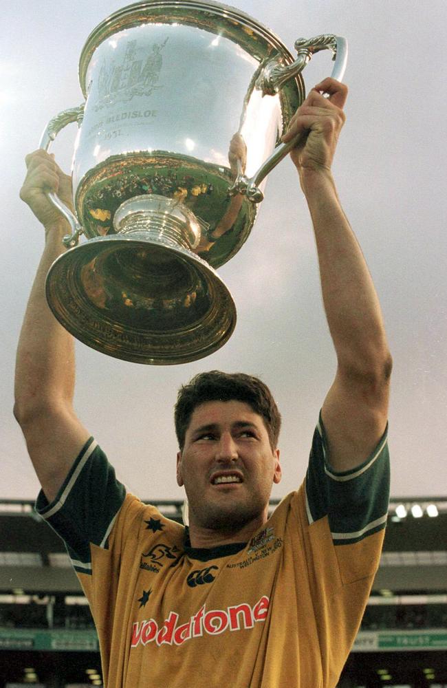 Wallabies captain John Eales holds aloft the Bledisloe Cup at Westpac Stadium in Wellington in 2000.