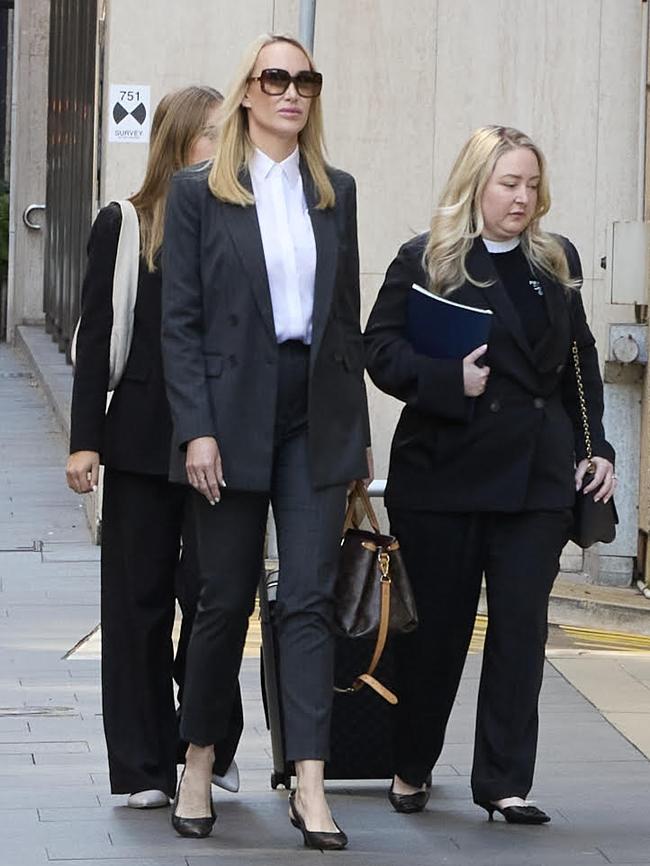 Linda Rogan (grey suit) spent the best part of last year locked in a legal stoush with her former billionaire lover, WiseTech Global founder Richard White Picture: Supplied