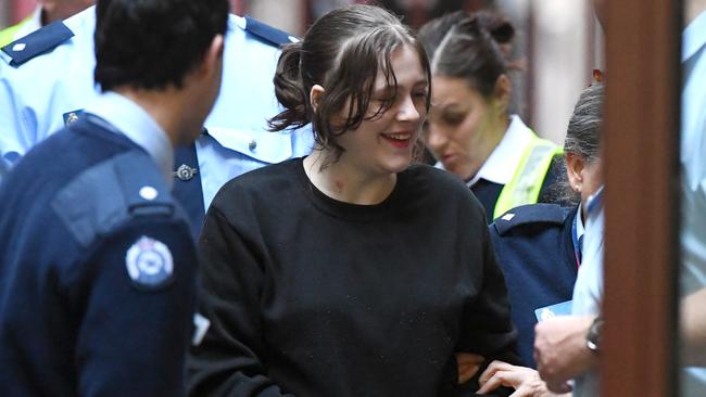 Jamie Lee Dolheguy smiles as she arrives at the Supreme Court. Picture: AAP Image/Julian Smith