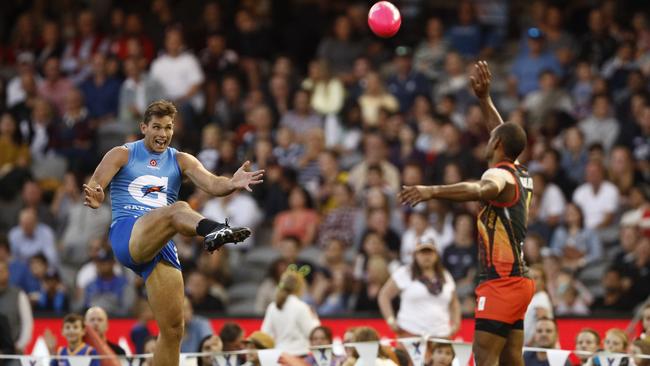 Tom Hawkins has a shot for goal in front of a crowd of 23,828 at Marvel Stadium. Picture: AAP<br/>                     