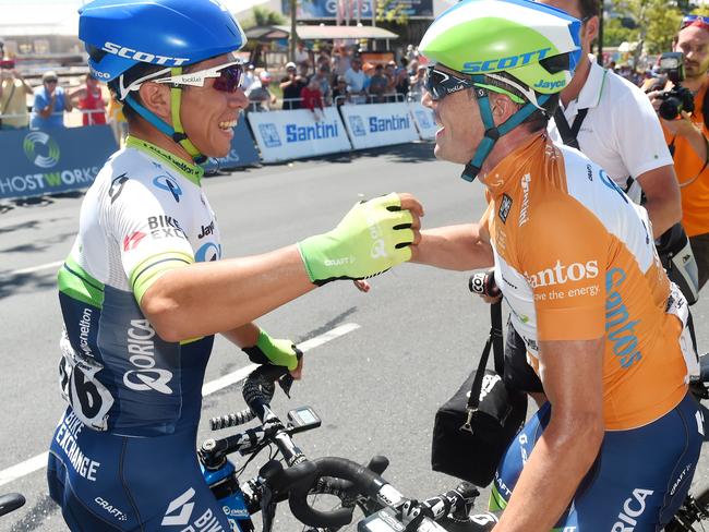 24/01/16 - Orica GreenEDGE team mates Caleb Ewan and Simmon Gerrans hug after Stage 6 of the Tour Down Under in Adelaide. Photo Tom Huntley