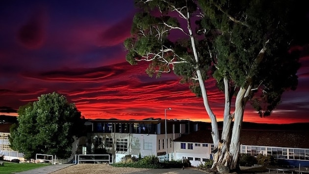 Sunrise from the 'office' at Taroona High School. Picture: Michael Wescombe. Your Focus on Tasmania **ONE TIME USE ONLY**