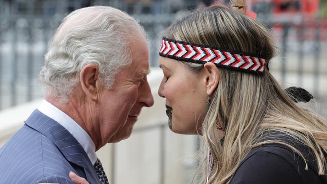 King Charles III uses the 'Hongi', a traditional Maori greeting of touching noses as he attends the 2023 Commonwealth Day Service at Westminster Abbey. Picture: Getty Images.